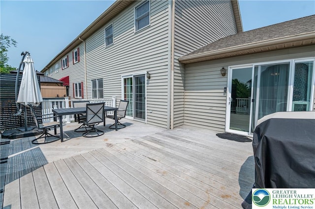 1411 Howard Ln, Palmer Twp, PA 18045 - wooden terrace with outdoor dining space and area for grilling