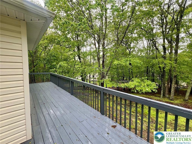 133 Summerton Cir, Stroud Twp, PA 18301 - wooden deck with view of wooded area
