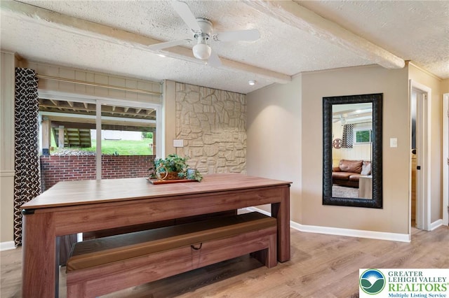 201 S 15th St, Emmaus Borough, PA 18049 - dining space with a textured ceiling, beam ceiling, light wood finished floors, baseboards, and a ceiling fan