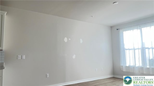 4904 Brookside Ct, Upper Saucon Twp, PA 18036 - spare room with light wood-style floors and baseboards