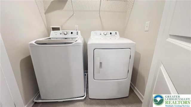 4904 Brookside Ct, Upper Saucon Twp, PA 18036 - laundry area featuring washing machine and clothes dryer and tile patterned flooring