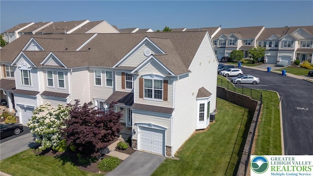 1838 Hemming Way S, Whitehall Twp, PA 18069 - multi unit property featuring an attached garage, a standing seam roof, a residential view, metal roof, and driveway