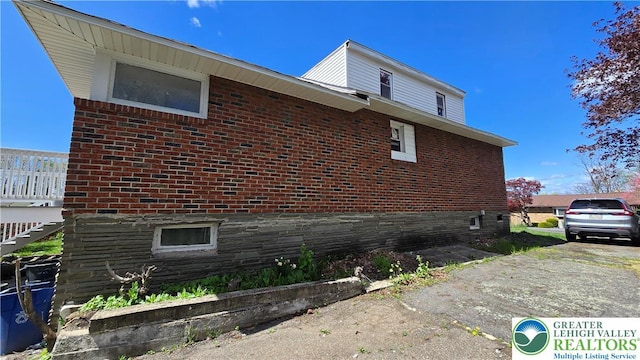 1126 Charles St, Luzerne, PA 18702 - view of property exterior with brick siding
