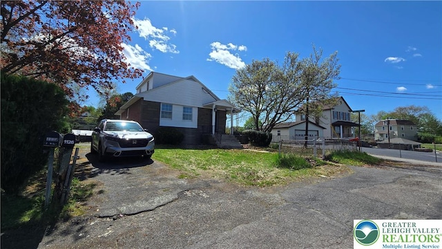 1126 Charles St, Luzerne, PA 18702 - view of front of property featuring asphalt driveway