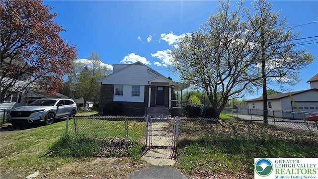 1126 Charles St, Luzerne, PA 18702 - bungalow featuring a gate