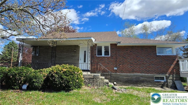 1126 Charles St, Luzerne, PA 18702 - bungalow-style house with brick siding and a shingled roof