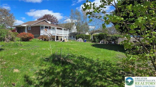1126 Charles St, Luzerne, PA 18702 - view of green lawn with a deck