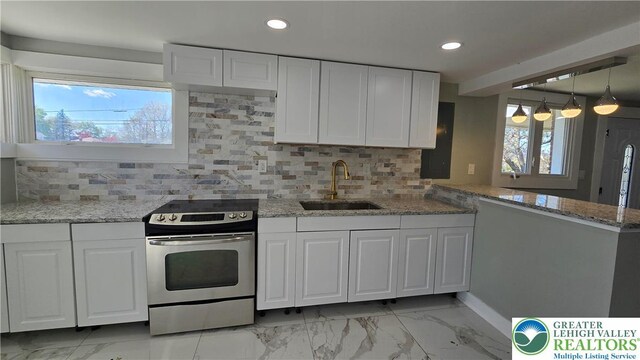 1126 Charles St, Luzerne, PA 18702 - kitchen featuring electric stove, a sink, white cabinets, and recessed lighting
