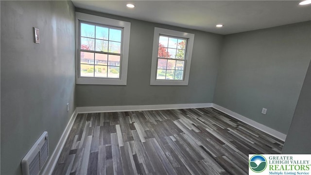 1126 Charles St, Luzerne, PA 18702 - unfurnished room featuring recessed lighting, dark wood-type flooring, and baseboards