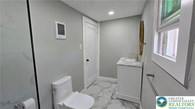 1126 Charles St, Luzerne, PA 18702 - bathroom featuring vanity, marble look tile flooring, toilet, recessed lighting, and baseboards