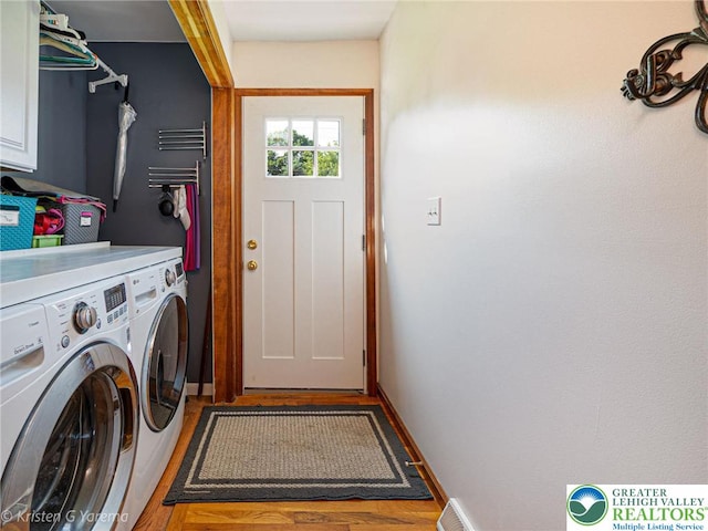 5054 Rainbow Ct, Lower Macungie Twp, PA 18106 - washroom featuring separate washer and dryer, cabinet space, and baseboards
