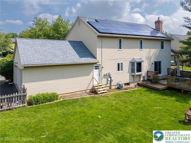 5054 Rainbow Ct, Lower Macungie Twp, PA 18106 - back of house with entry steps, a wooden deck, solar panels, a chimney, and a shingled roof