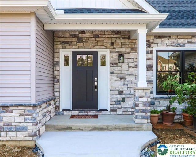 448 Long Lane Rd, Lehigh Twp, PA 18088 - entrance to property with stone siding and roof with shingles