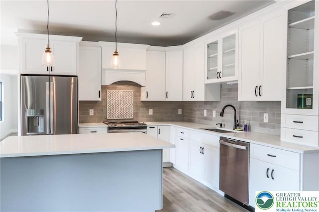 448 Long Lane Rd, Lehigh Twp, PA 18088 - kitchen featuring appliances with stainless steel finishes, a sink, pendant lighting, and white cabinetry