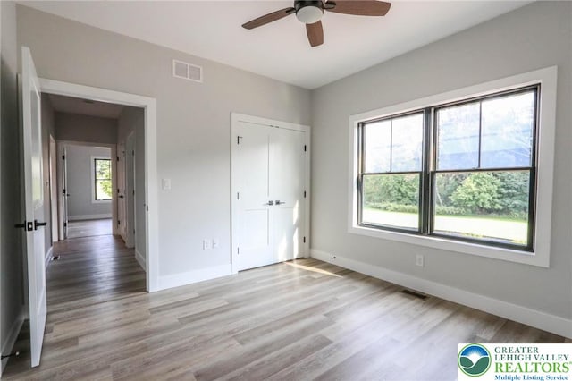 448 Long Lane Rd, Lehigh Twp, PA 18088 - unfurnished bedroom with light wood finished floors, baseboards, a closet, and ceiling fan