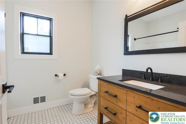 448 Long Lane Rd, Lehigh Twp, PA 18088 - full bath with toilet, vanity, baseboards, tile patterned floors, and a shower