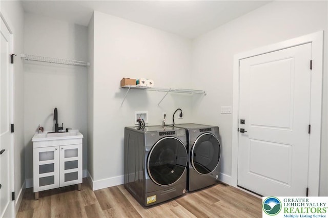 448 Long Lane Rd, Lehigh Twp, PA 18088 - laundry room featuring separate washer and dryer, light wood finished floors, and baseboards