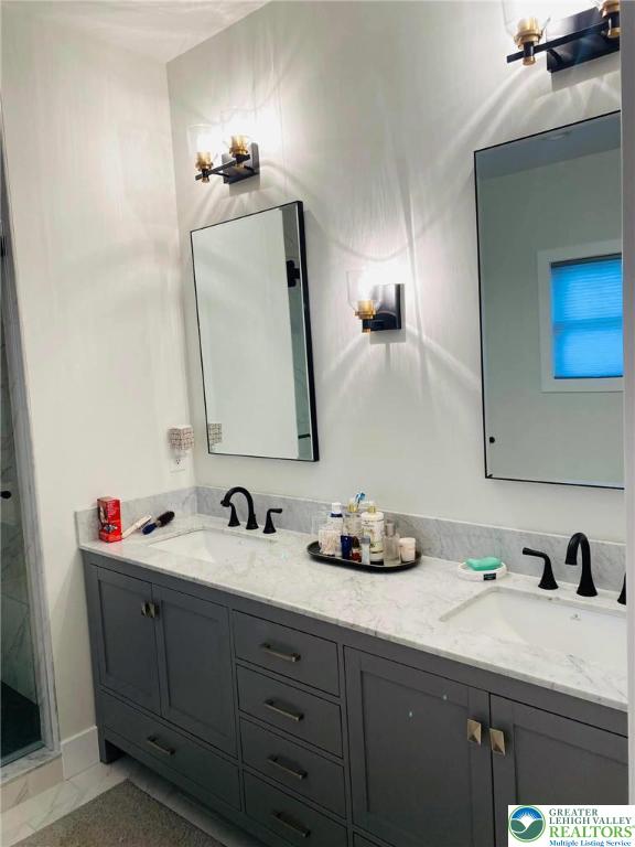 448 Long Lane Rd, Lehigh Twp, PA 18088 - bathroom featuring double vanity and a shower stall
