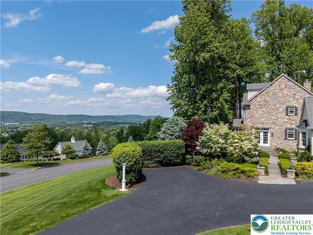 5355 Saucon Ridge Rd, Upper Saucon Twp, PA 18036 - exterior space with stone siding