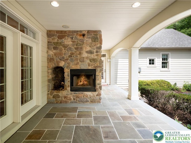 5355 Saucon Ridge Rd, Upper Saucon Twp, PA 18036 - view of patio / terrace featuring an outdoor stone fireplace