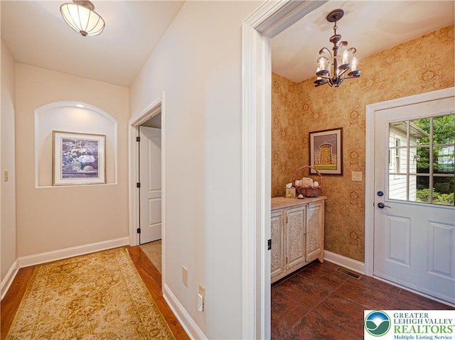 5355 Saucon Ridge Rd, Upper Saucon Twp, PA 18036 - doorway featuring a chandelier and baseboards