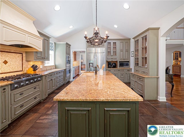 5355 Saucon Ridge Rd, Upper Saucon Twp, PA 18036 - kitchen with appliances with stainless steel finishes, a chandelier, a kitchen island with sink, custom range hood, and lofted ceiling