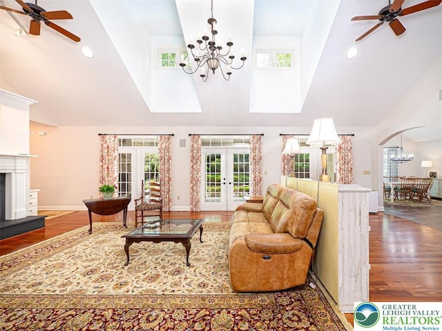 5355 Saucon Ridge Rd, Upper Saucon Twp, PA 18036 - living room with high vaulted ceiling, a chandelier, french doors, a ceiling fan, and wood finished floors