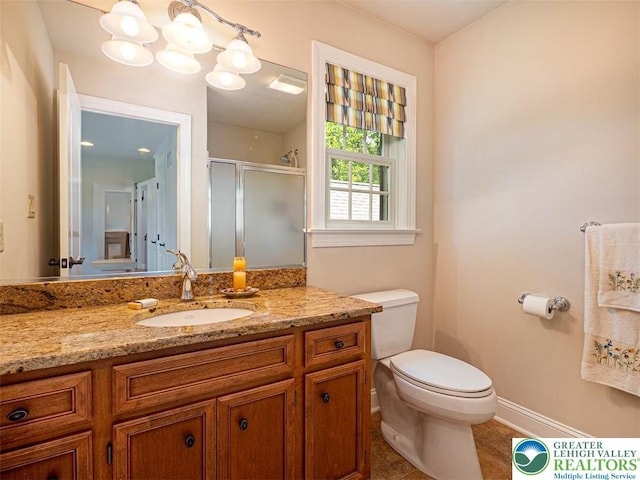 5355 Saucon Ridge Rd, Upper Saucon Twp, PA 18036 - full bathroom with vanity, a stall shower, toilet, tile patterned flooring, and baseboards