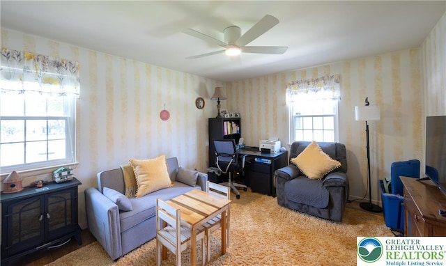 2765 Rolling Green Pl, Lower Macungie Twp, PA 18062 - living room featuring wallpapered walls, a ceiling fan, and an office area