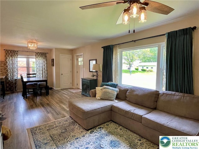 938 N Broad St, Allentown City, PA 18104 - living room with ceiling fan, wood finished floors, and baseboards