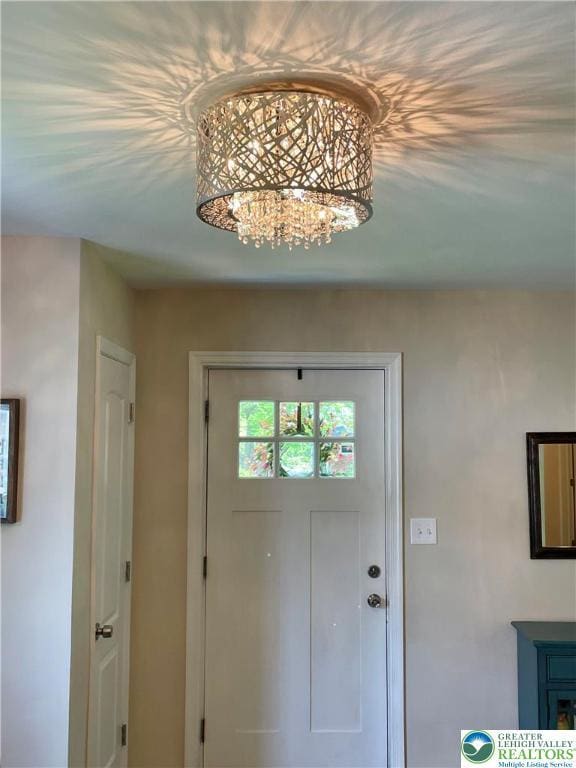 938 N Broad St, Allentown City, PA 18104 - entryway with a chandelier