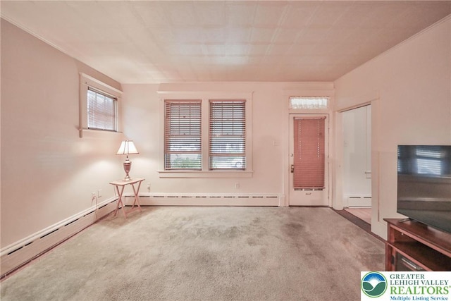 30 S 16th St, Wilson Boro, PA 18042 - unfurnished living room with baseboard heating, carpet, and a baseboard heating unit