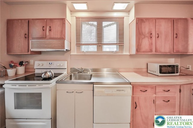 30 S 16th St, Wilson Boro, PA 18042 - kitchen with white appliances, premium range hood, and light countertops