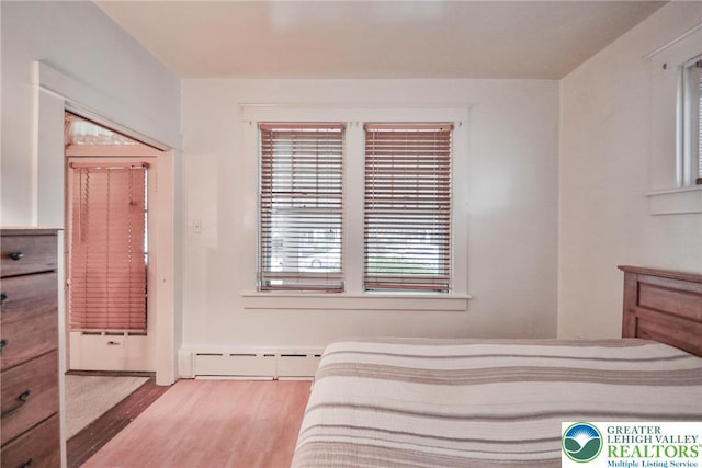 30 S 16th St, Wilson Boro, PA 18042 - bedroom featuring wood finished floors and baseboard heating
