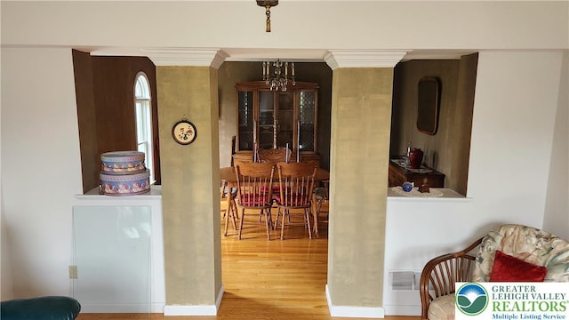 391 W Mayfield Cir, Lower Nazareth Twp, PA 18020 - dining area with wood finished floors and a chandelier