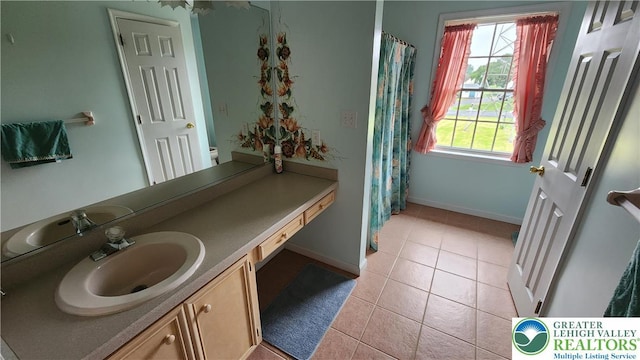 391 W Mayfield Cir, Lower Nazareth Twp, PA 18020 - bathroom featuring vanity, tile patterned flooring, and baseboards