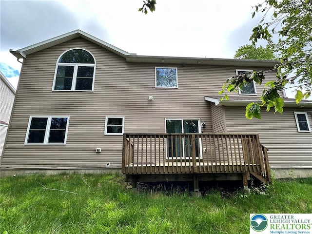 7190 Rimrock Dr, Coolbaugh Twp, PA 18466 - rear view of property featuring a wooden deck