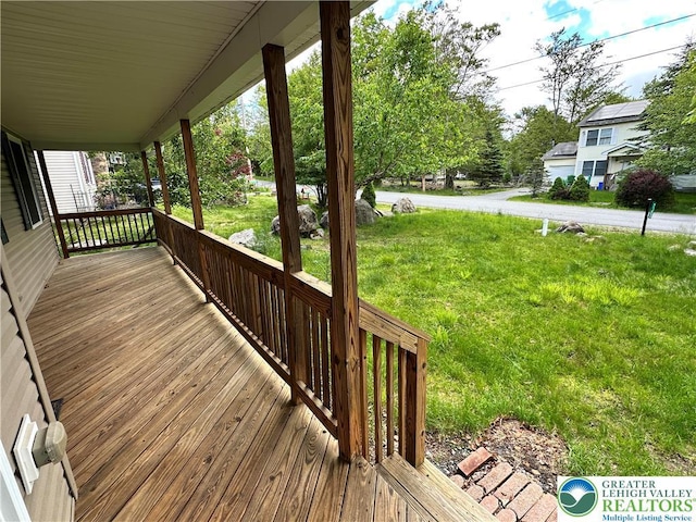 7190 Rimrock Dr, Coolbaugh Twp, PA 18466 - porch featuring a lawn