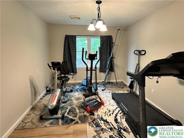 7190 Rimrock Dr, Coolbaugh Twp, PA 18466 - workout area with baseboards and wood finished floors