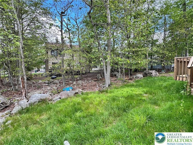 7190 Rimrock Dr, Coolbaugh Twp, PA 18466 - view of yard featuring view of scattered trees