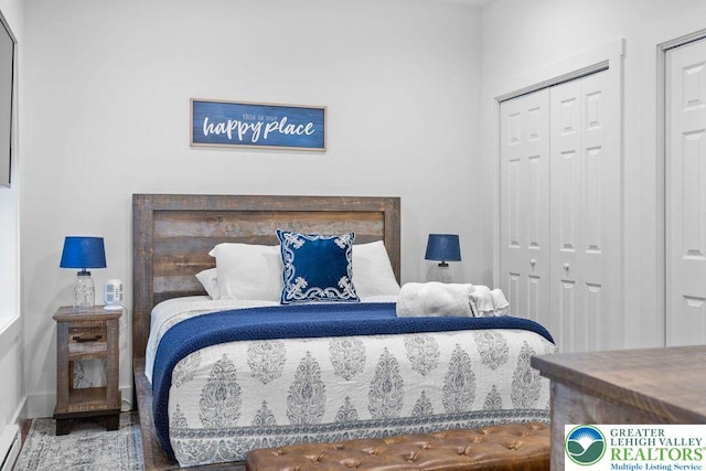 22 Petrarch Trl, Penn Forest Twp, PA 18210 - bedroom with baseboards, a closet, and wood finished floors