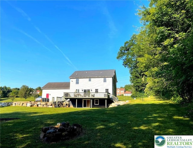 968 Renaldi Rd, Bushkill Twp, PA 18091 - back of property featuring a wooden deck, stairs, and a yard