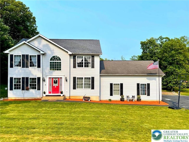 968 Renaldi Rd, Bushkill Twp, PA 18091 - colonial inspired home featuring a front yard and roof with shingles