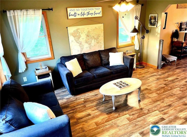 968 Renaldi Rd, Bushkill Twp, PA 18091 - living room featuring wood finished floors, a ceiling fan, and baseboards