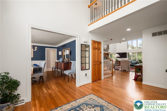 1560 Surrey Rd, Lower Saucon Twp, PA 18015 - foyer with stairway, wood finished floors, baseboards, ornamental molding, and recessed lighting