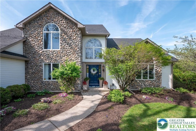 1560 Surrey Rd, Lower Saucon Twp, PA 18015 - view of front of property featuring stone siding and roof with shingles