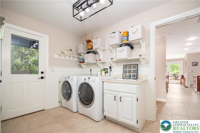 1560 Surrey Rd, Lower Saucon Twp, PA 18015 - washroom featuring cabinet space, washer and dryer, and light tile patterned floors