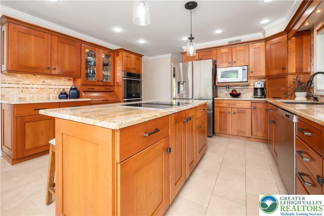 1560 Surrey Rd, Lower Saucon Twp, PA 18015 - kitchen with stainless steel appliances, a sink, crown molding, backsplash, and a center island
