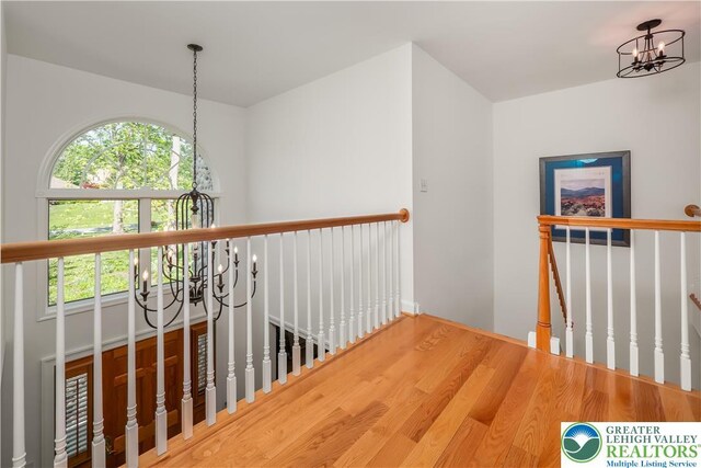 1560 Surrey Rd, Lower Saucon Twp, PA 18015 - corridor featuring a chandelier, an upstairs landing, and wood finished floors
