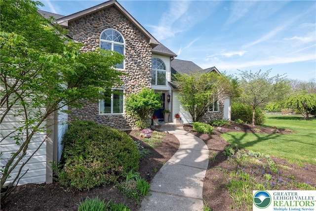 1560 Surrey Rd, Lower Saucon Twp, PA 18015 - traditional-style home featuring stone siding and a front yard
